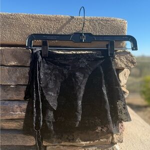 Ballet black print lace short wrap skirt women size small by
Tata’s Dancewear